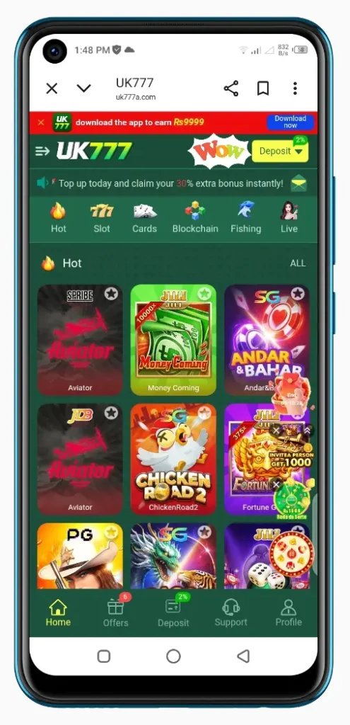 UK777 game app main dashboard showing slots, cards, blockchain and fishing games